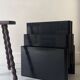 Large black magazine rack by Giotto Stoppino for Kartell, Italy 1970.
