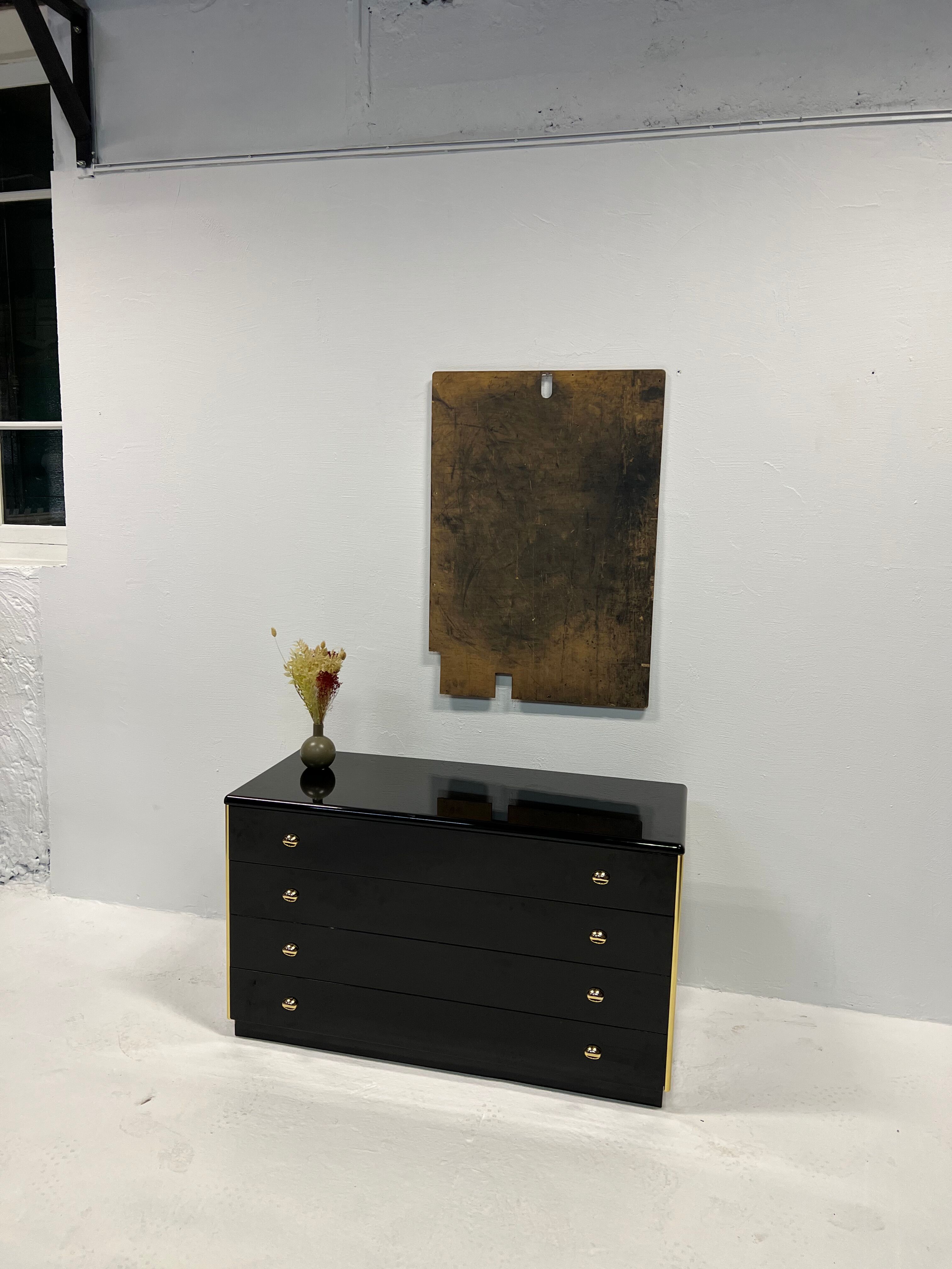 Black lacquered chest of drawers