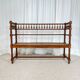 Antique banquette in Louis XIII style, turned wood with caning, late 19th to early 20th century.