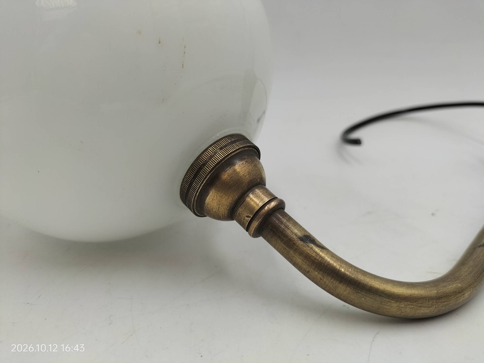 Brass and glass wall light