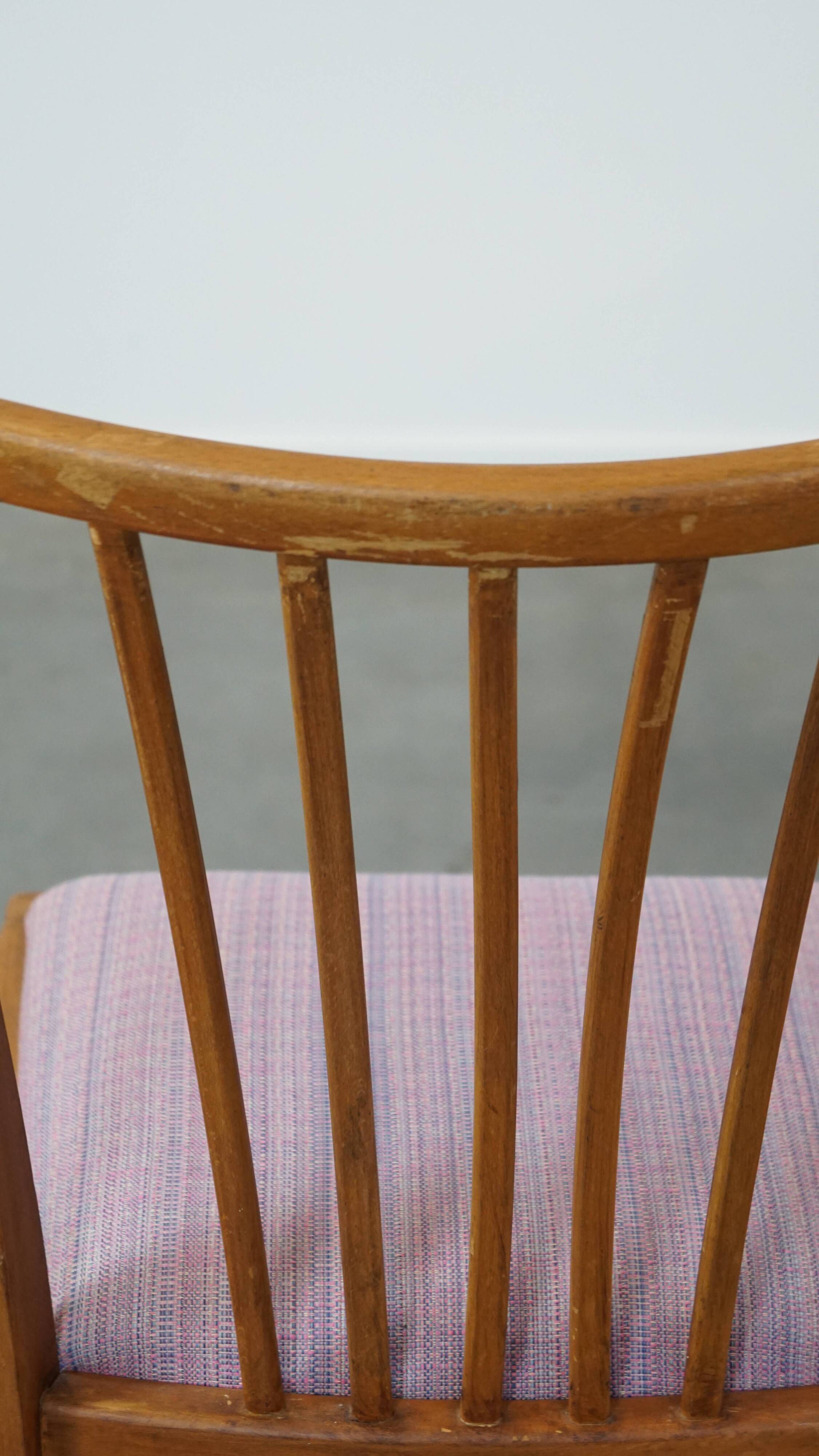 Set of 4 vintage Danish design dining chairs from the 1970s with light purple fabric seats