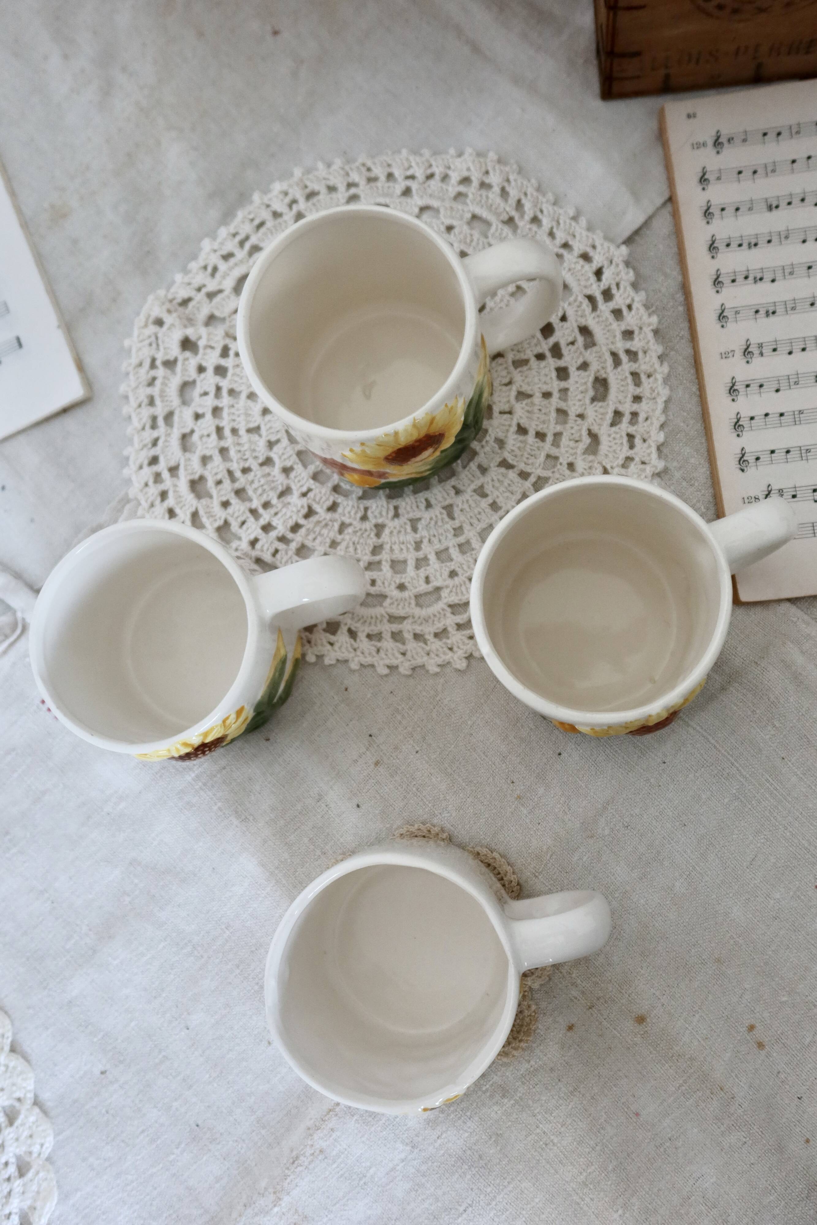 Set of 4 vintage barbotine cups / mugs with polychrome sunflower pattern