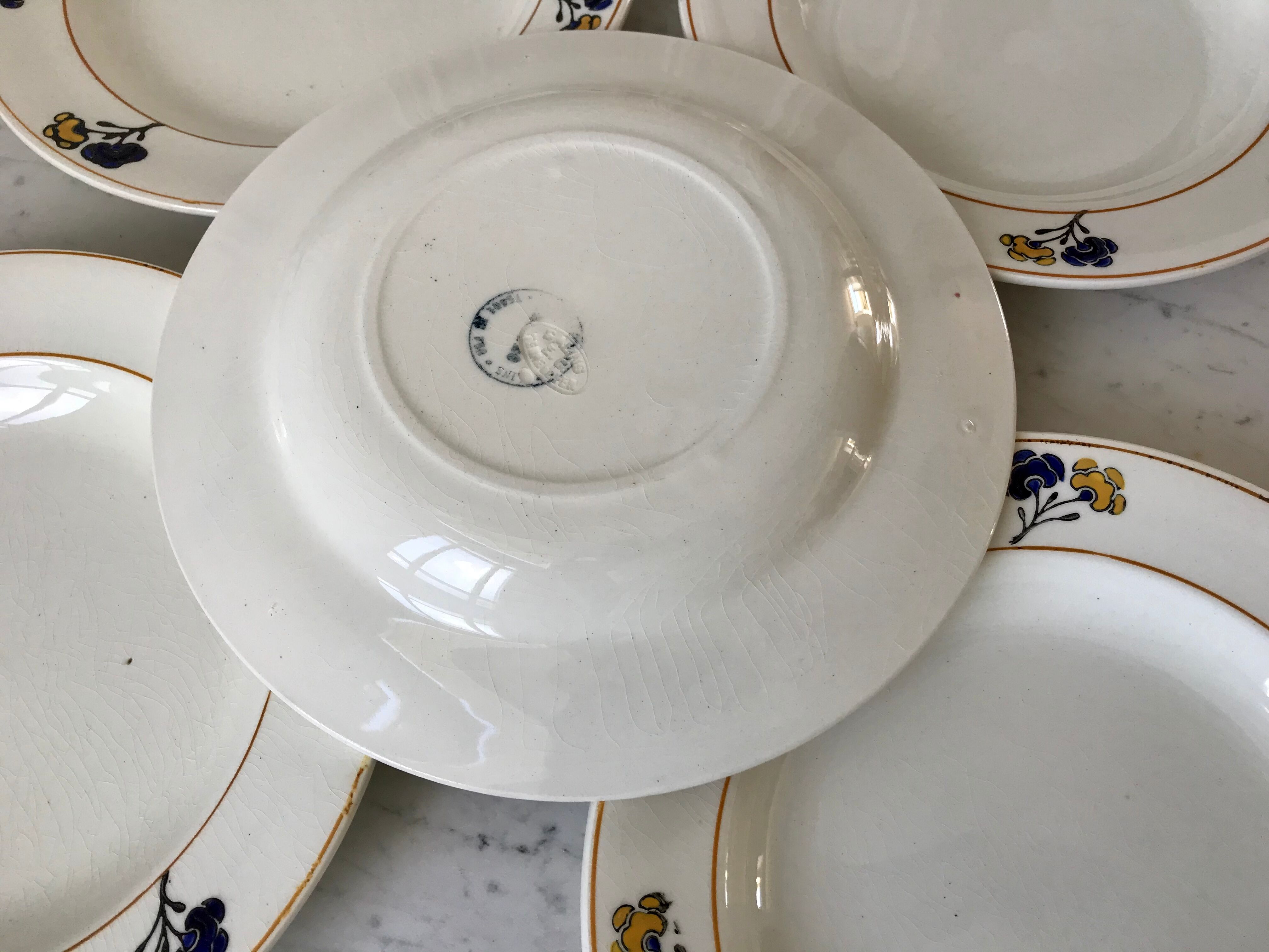 Set of 5 hollow plates Iron Earth model "Romeo" early XXth