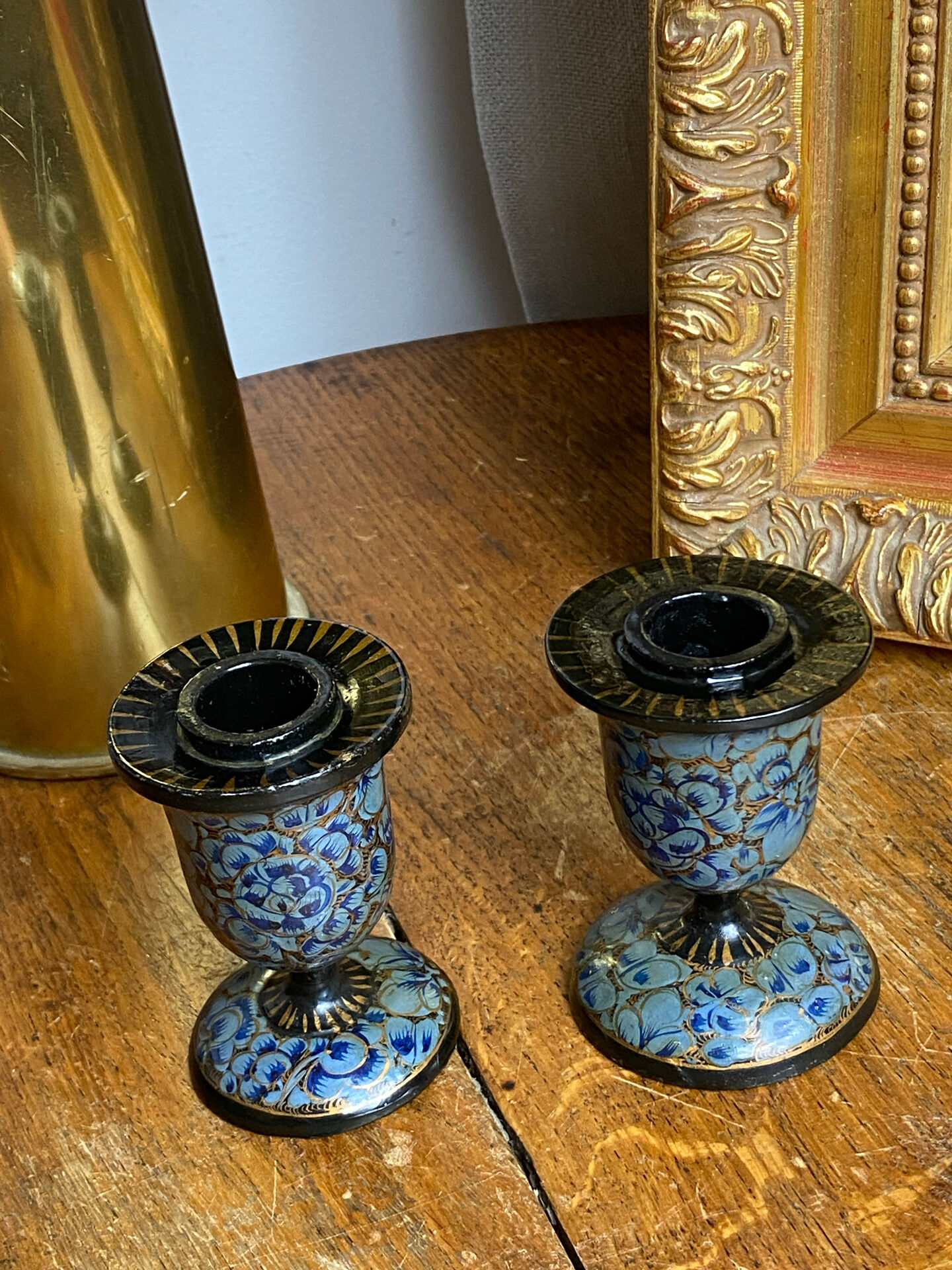 Pair of Kashmiri candlesticks, lacquered papier-mâché