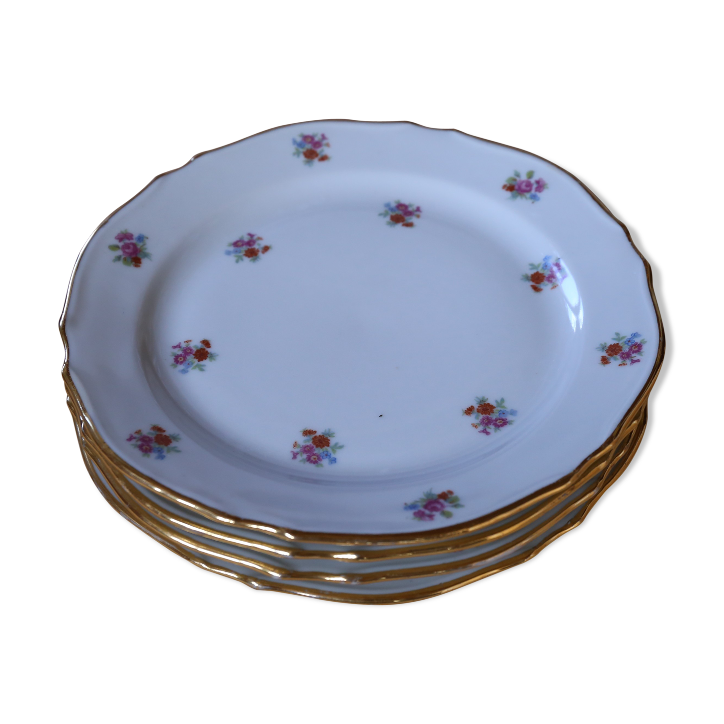 4 small vintage floral plates made of French porcelain