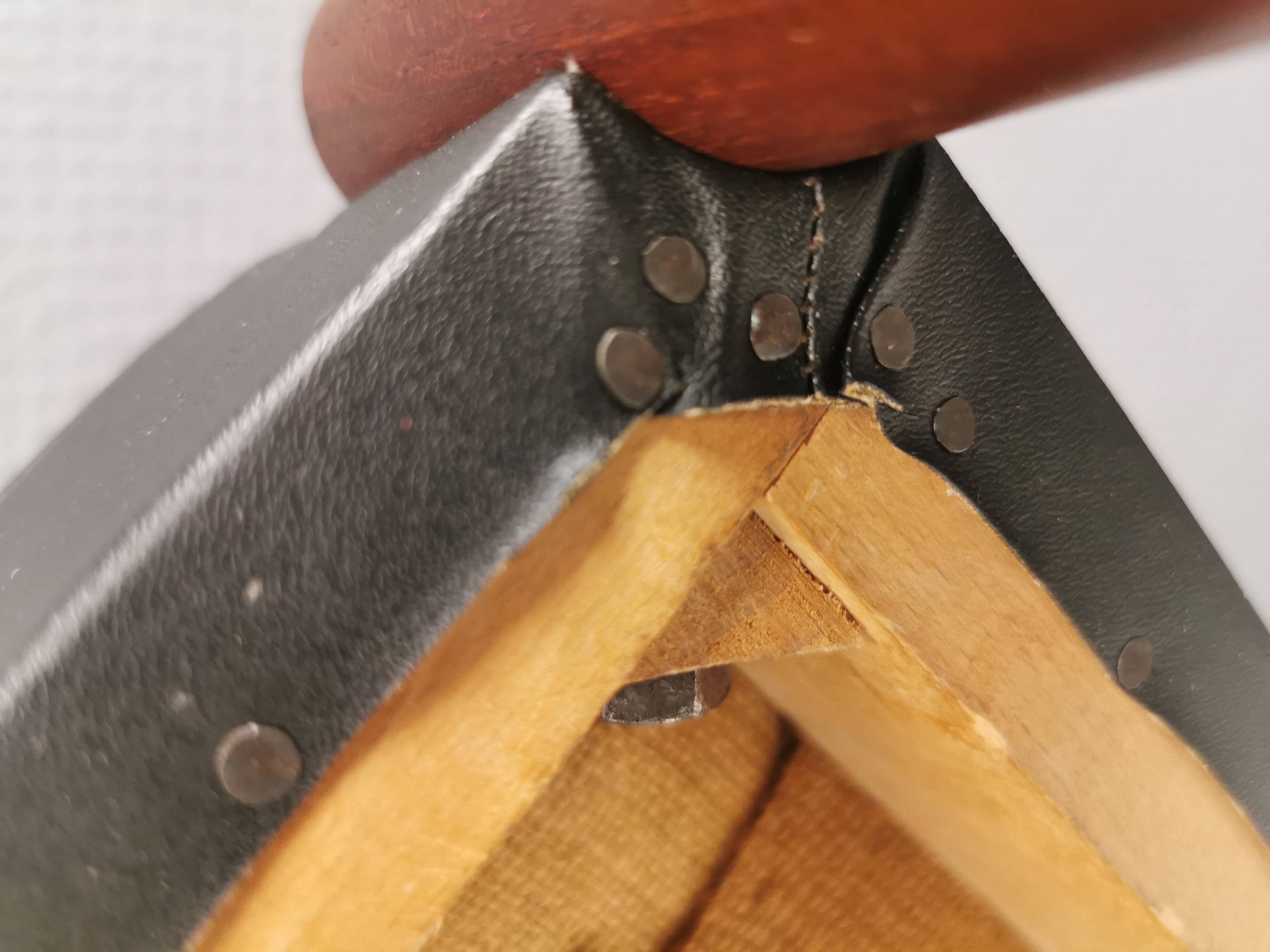 Footstool with teak wood legs and black skai (imitation leather) 1970s