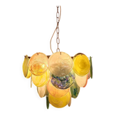 Handcrafted chandelier with Murano glass discs.
