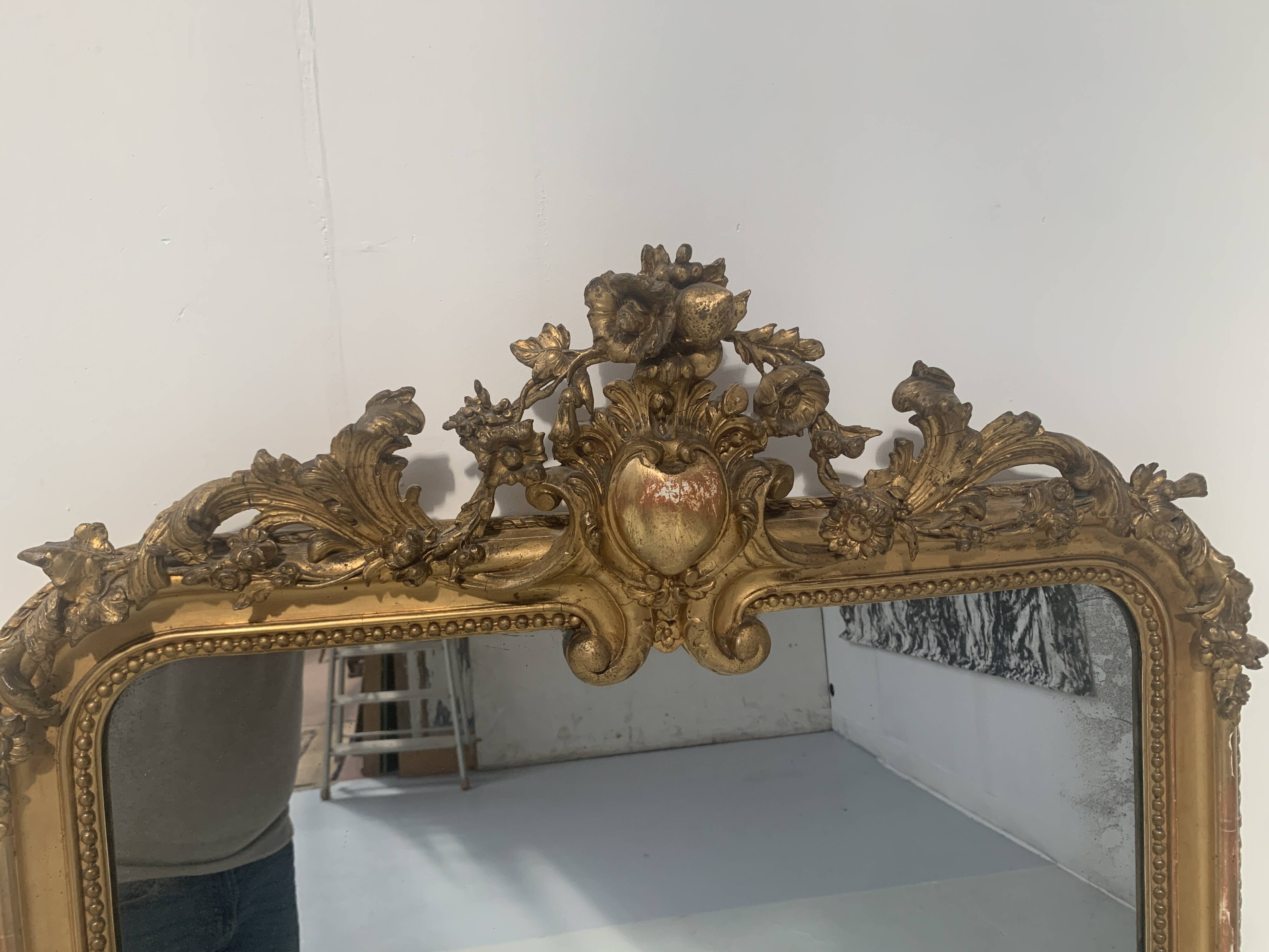 Louis XV style mirror in wood and gilded stucco, 19th century