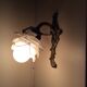 Old wall lamp in bronze and glass