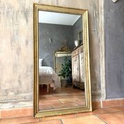 Antique Napoleon III gilded mirror from the 19th century.