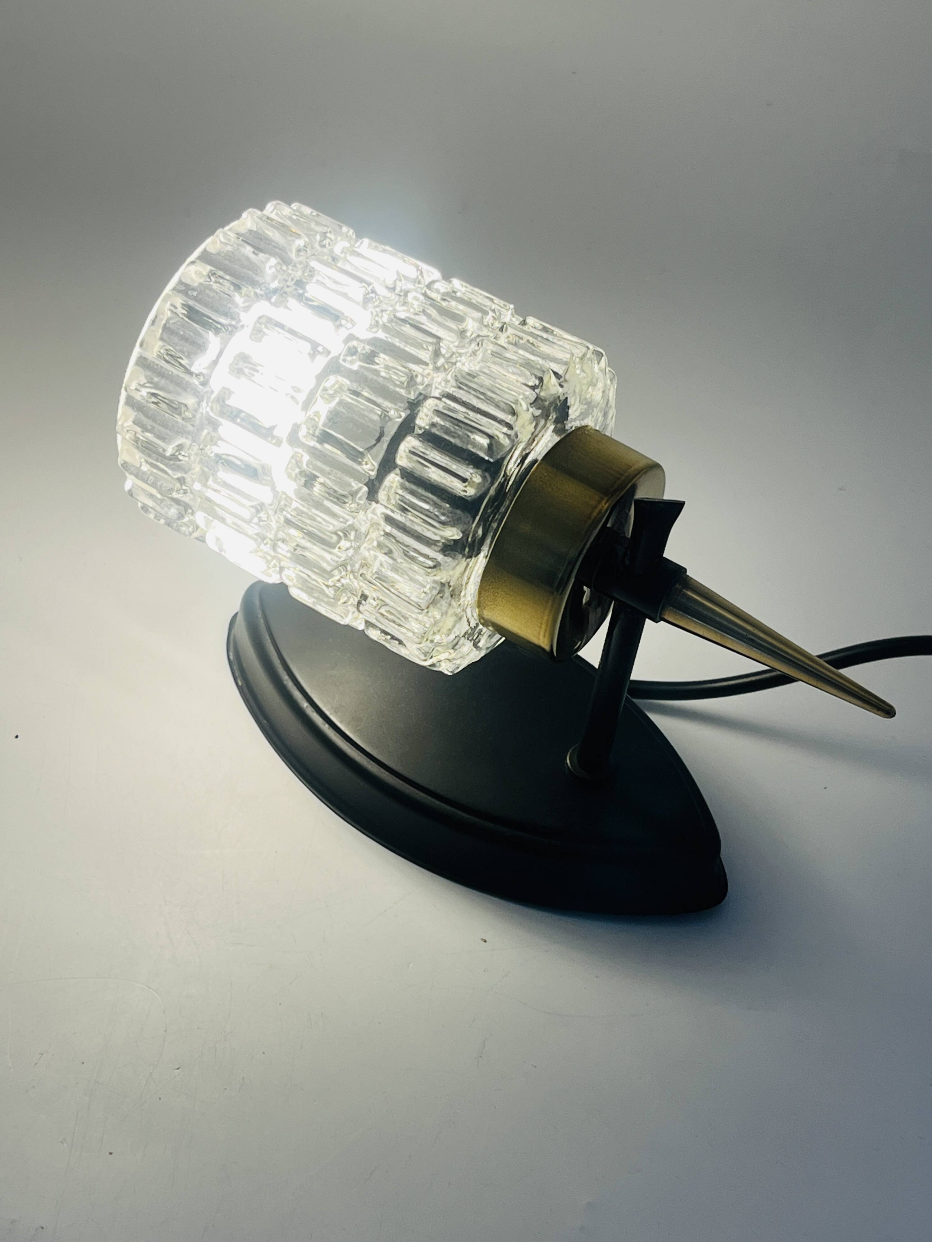 Pair of vintage wall lights with textured glass, attributed to Maison Arlus.