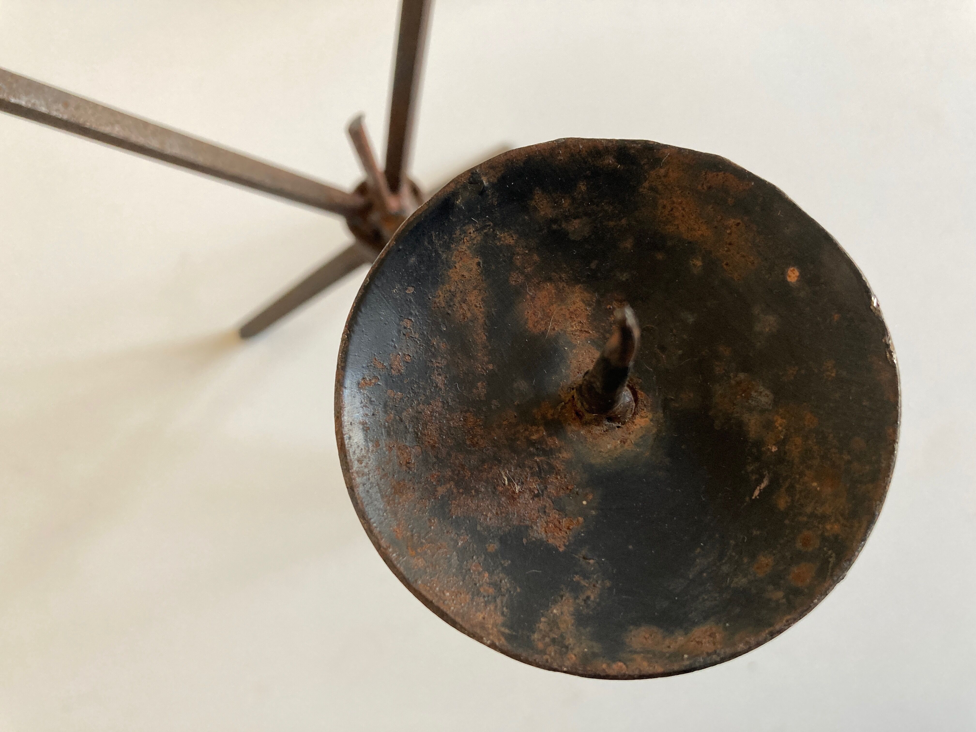 Brutalist beaten-iron campaign candlestick 1970