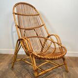 Pair of designer armchairs in rattan