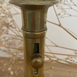 Brass candle holder with push button