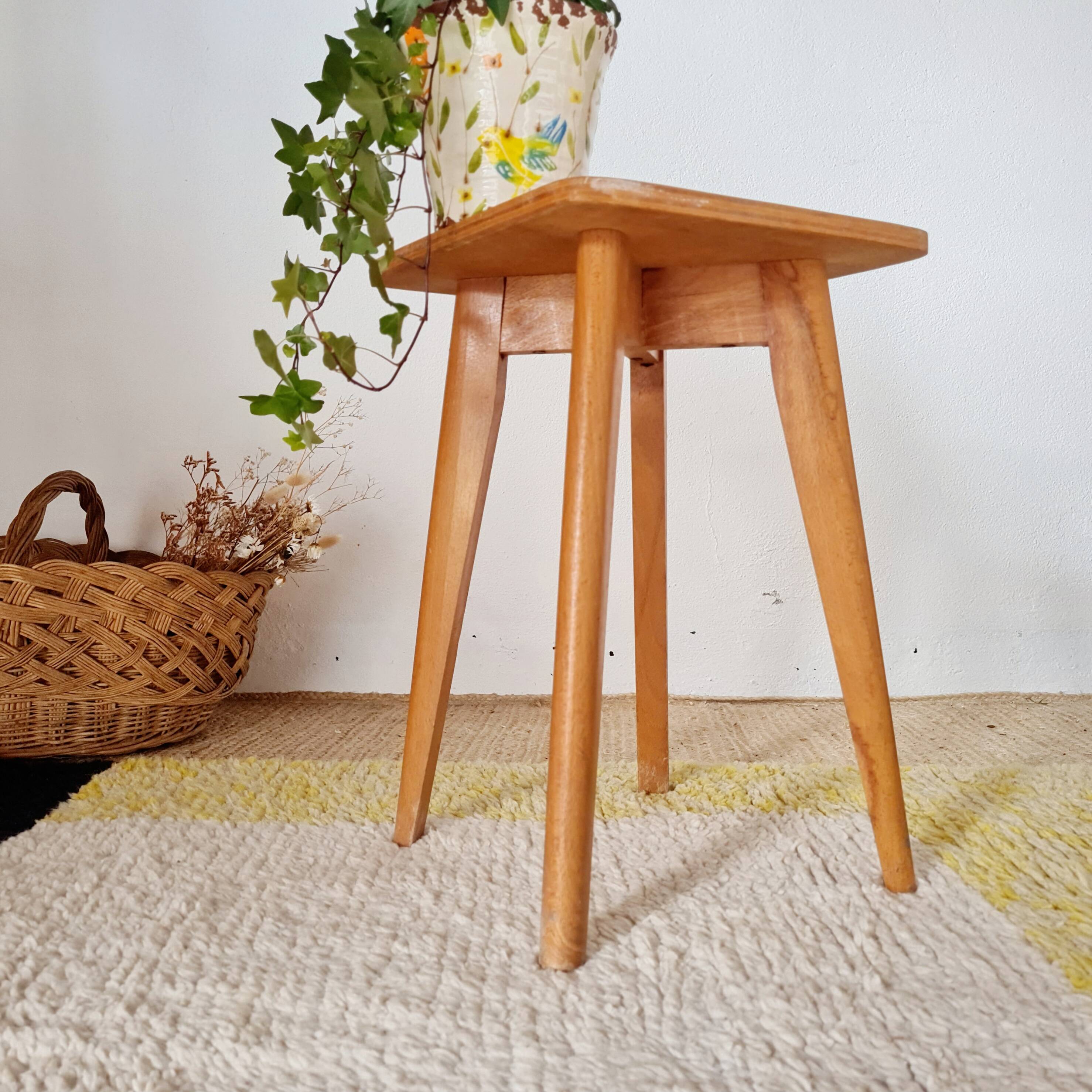 Wooden stool with tapered legs