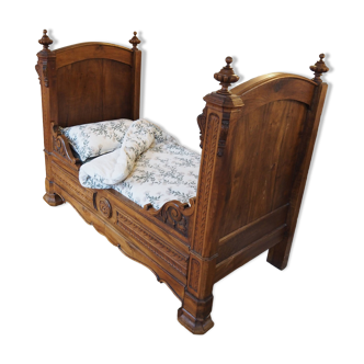 Antique carved wooden bed