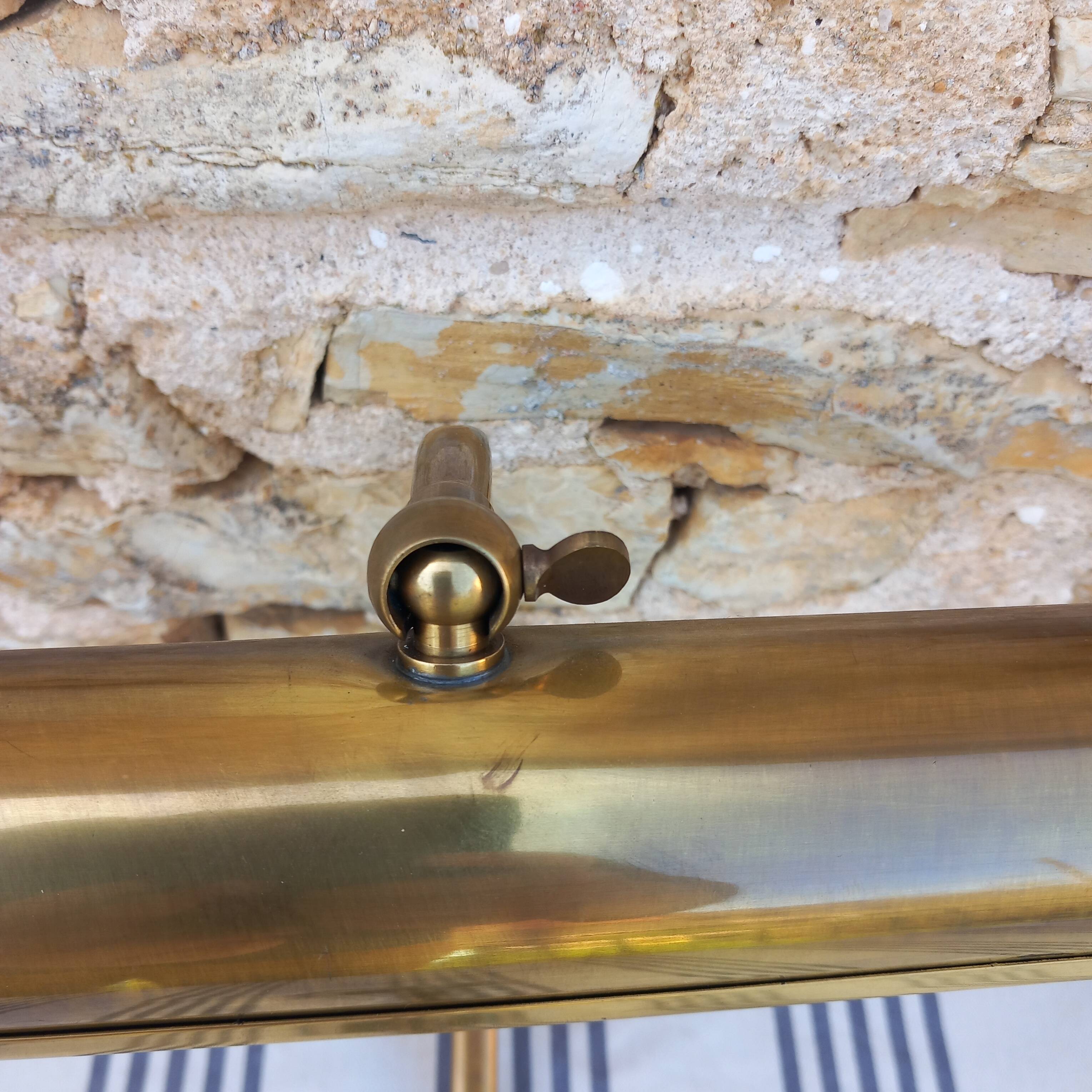 Brass wall light for picture lighting