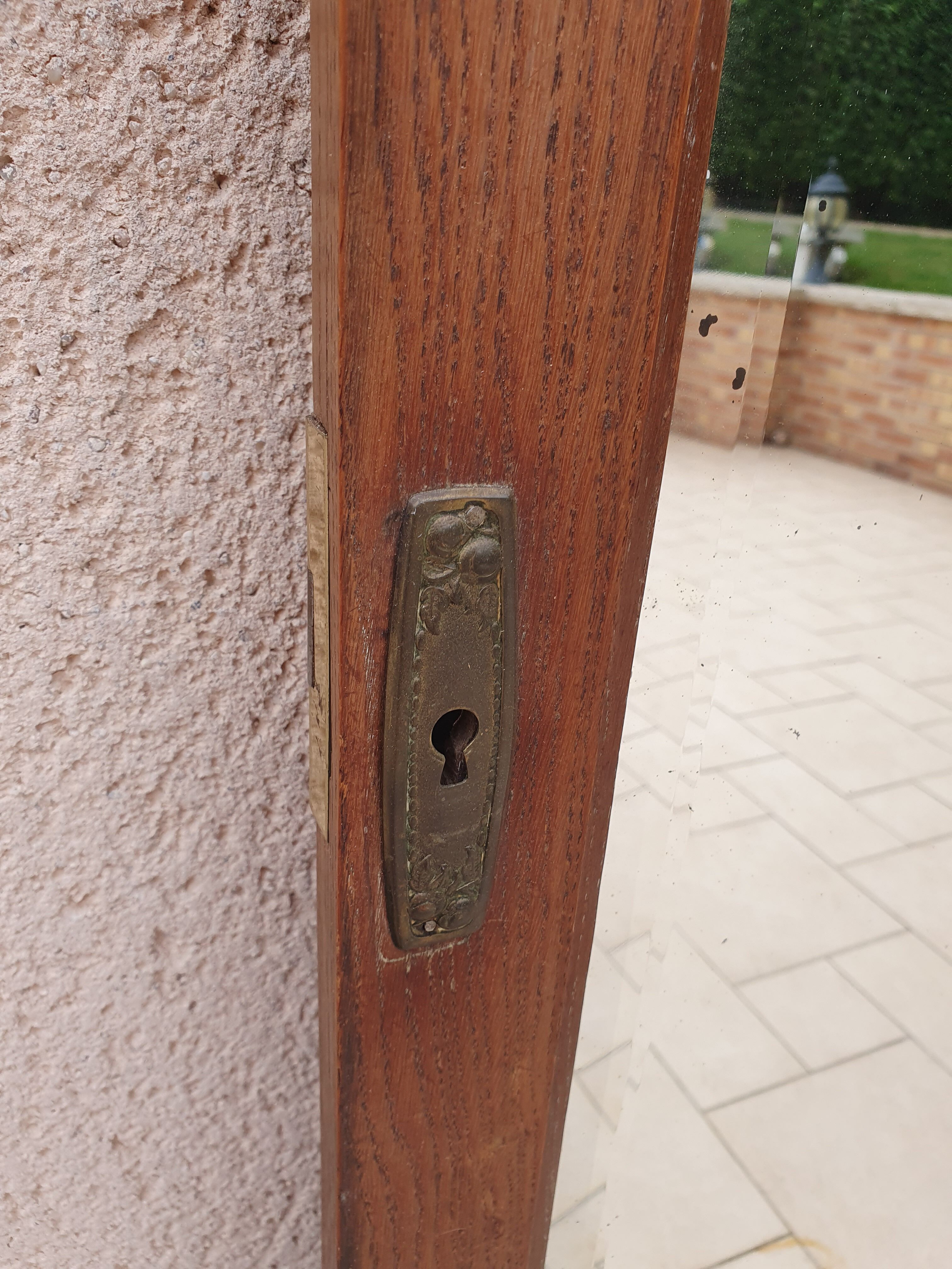 Beveled mirror on door