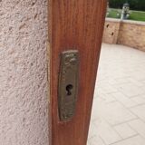 Beveled mirror on door