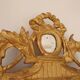 Miroir Louis XVI en bois doré 35x 65cm