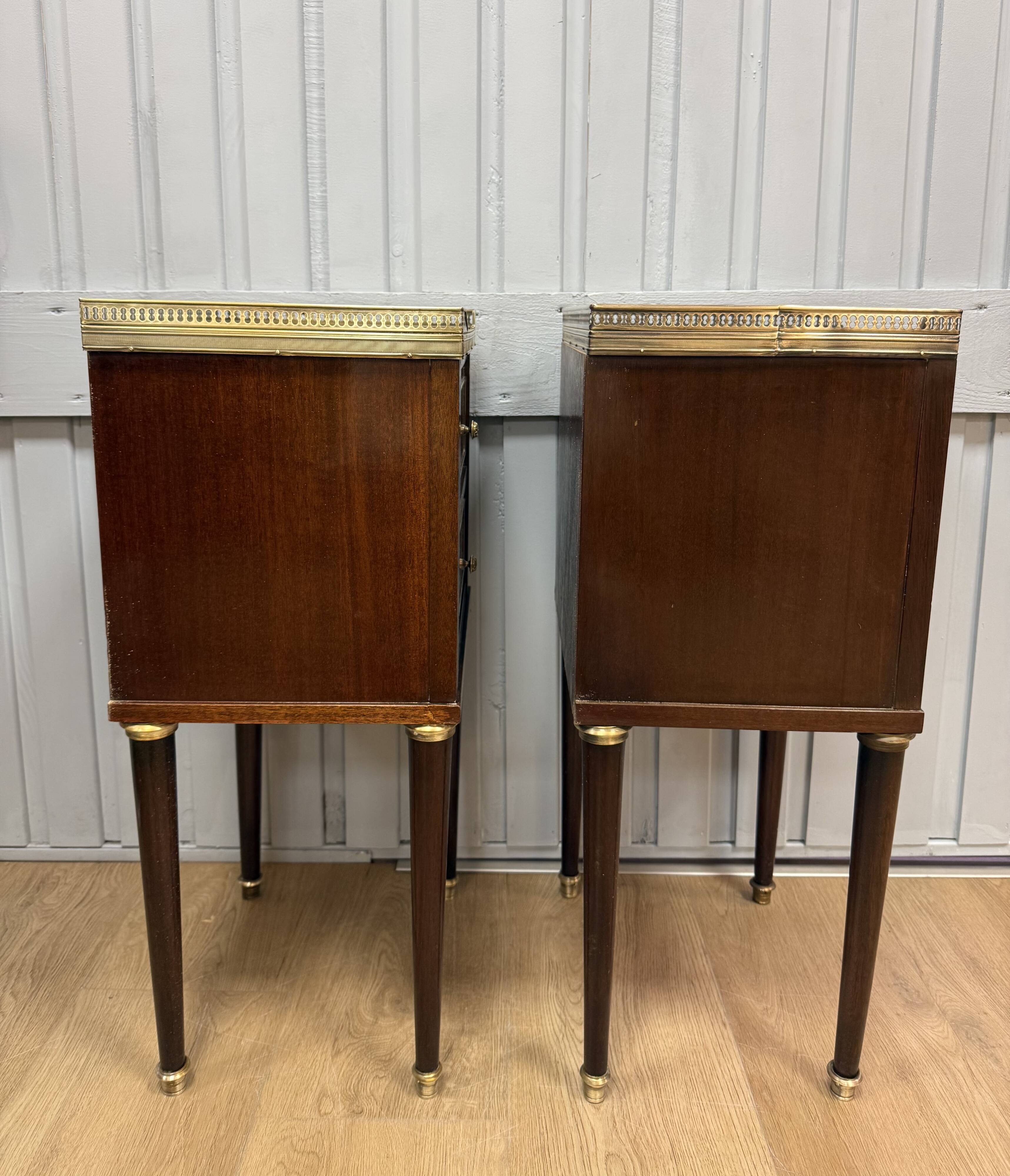 Pair of Louis XVI style bedside tables in mahogany