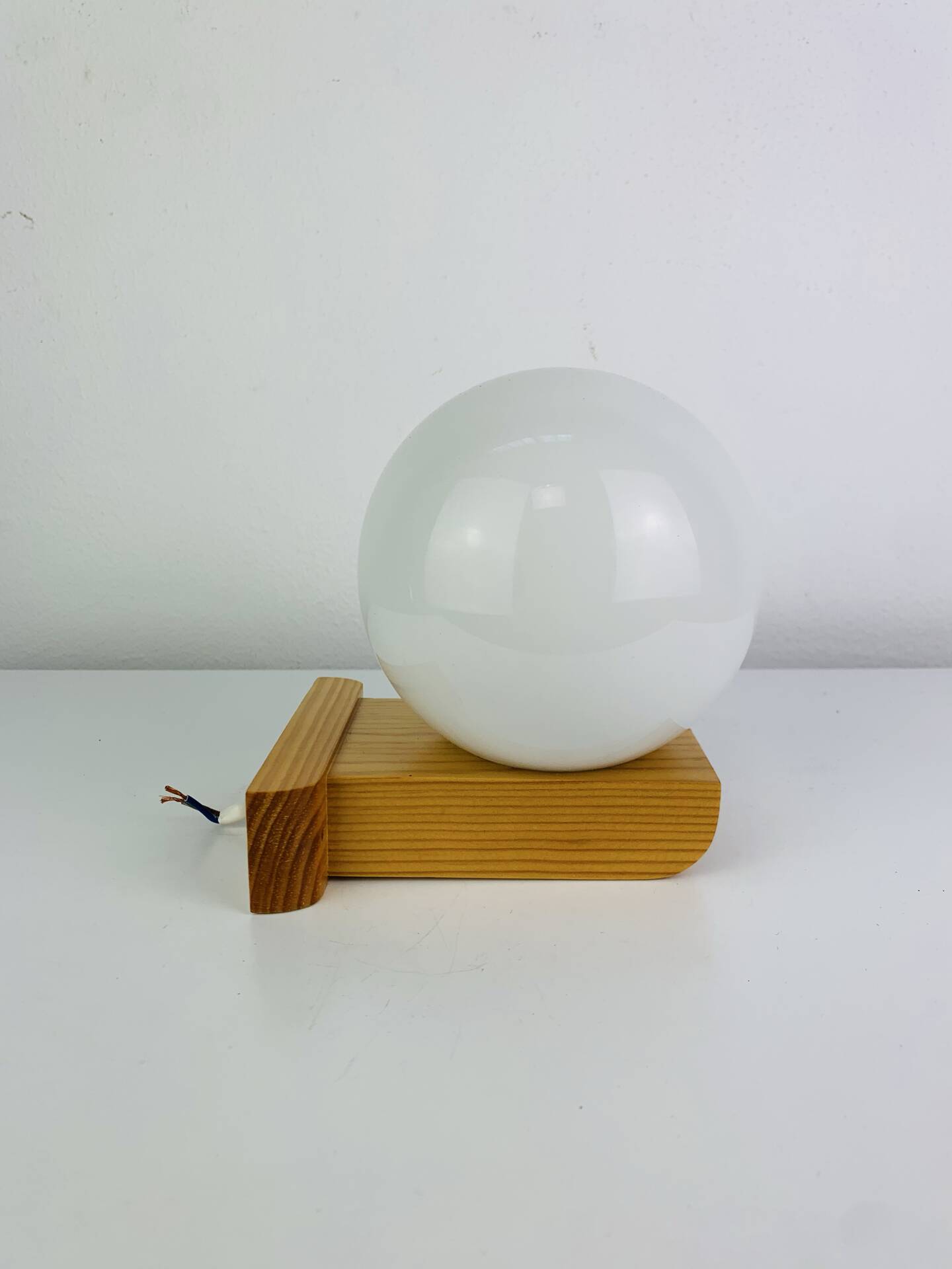 Vintage Tissot opaline globe and pin wall light.