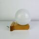 Vintage Tissot opaline globe and pin wall light.