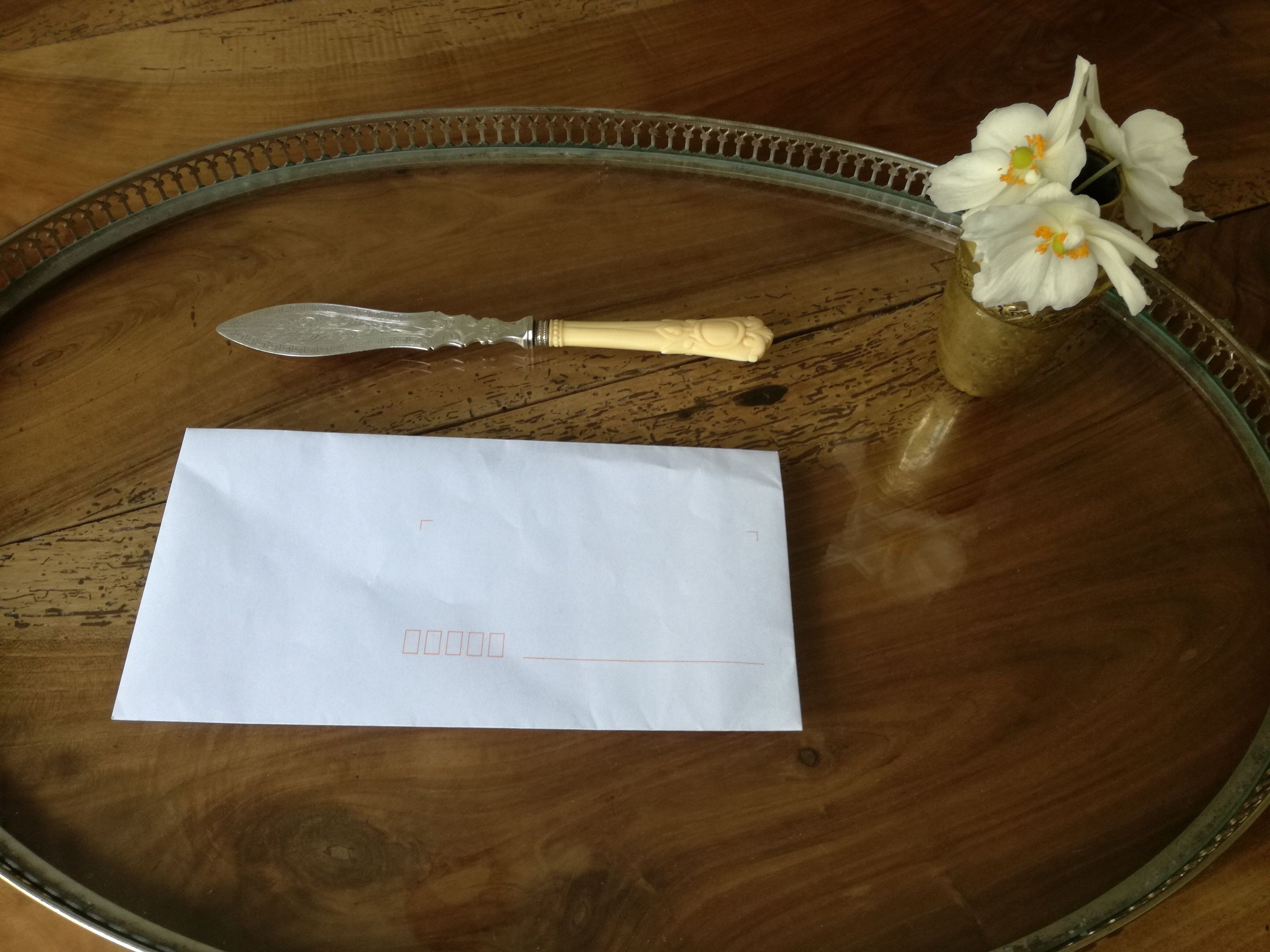 Silver and ivory paper cut