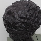 Greek head in waxed black plaster