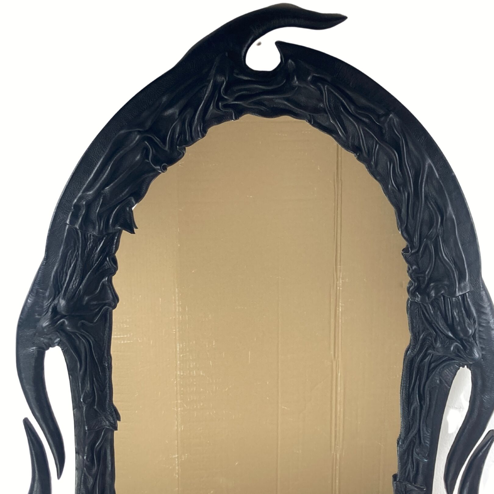 Midcentury wavy "Art Nouveau" leather wrapped mirror