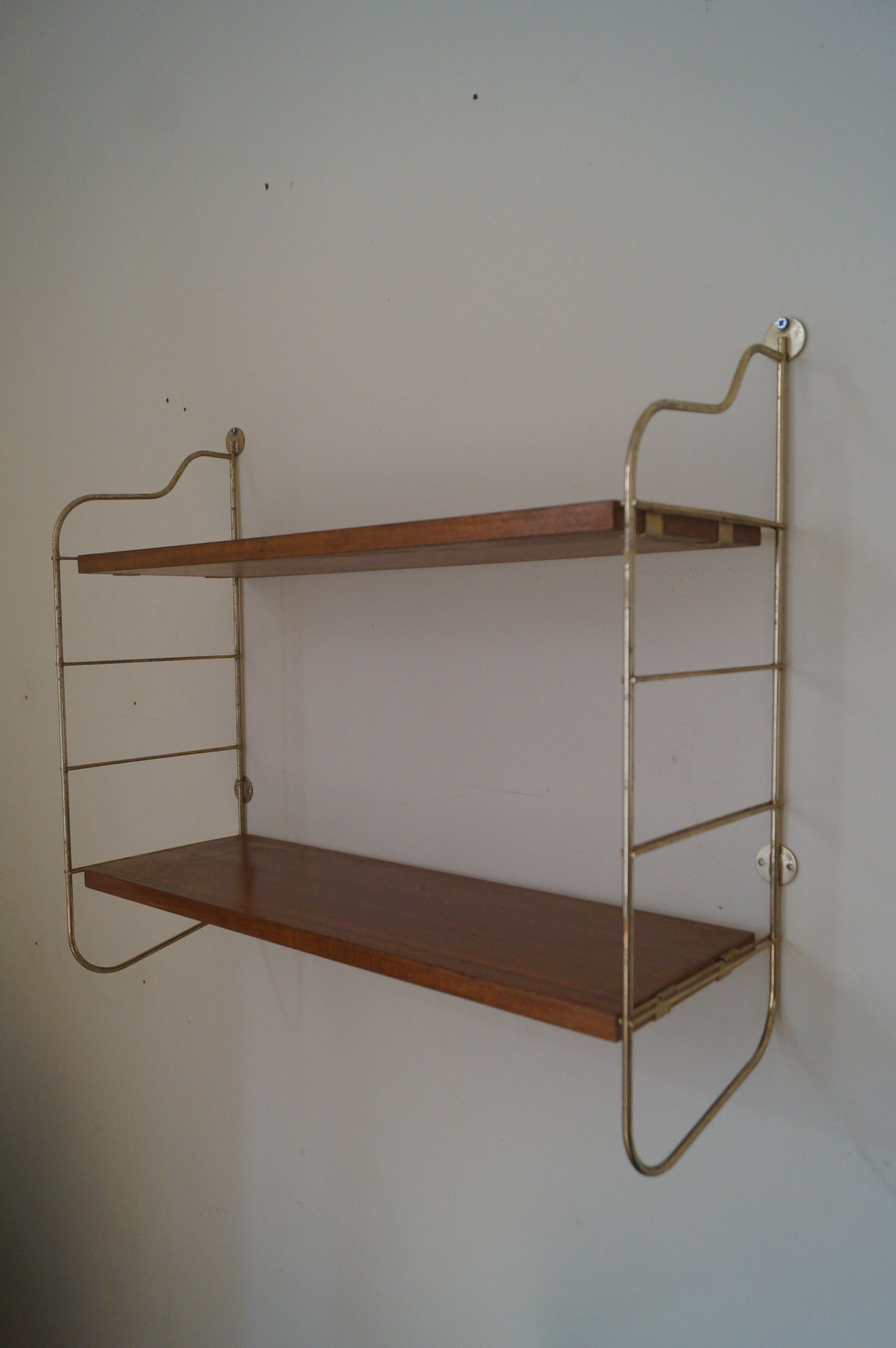 Wall shelf string 1960