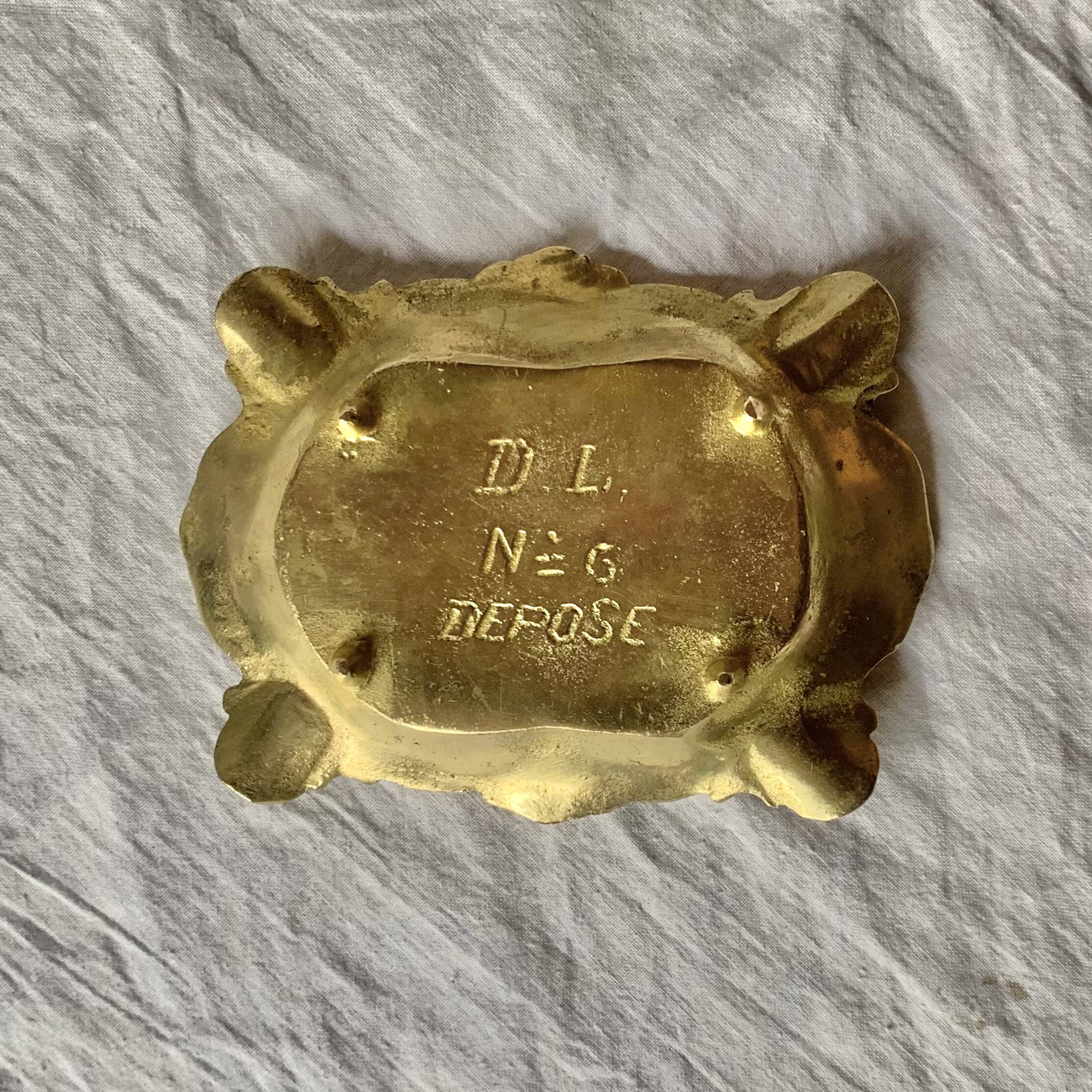 Neo-Baroque brass ashtray stamped DL number 6 registered