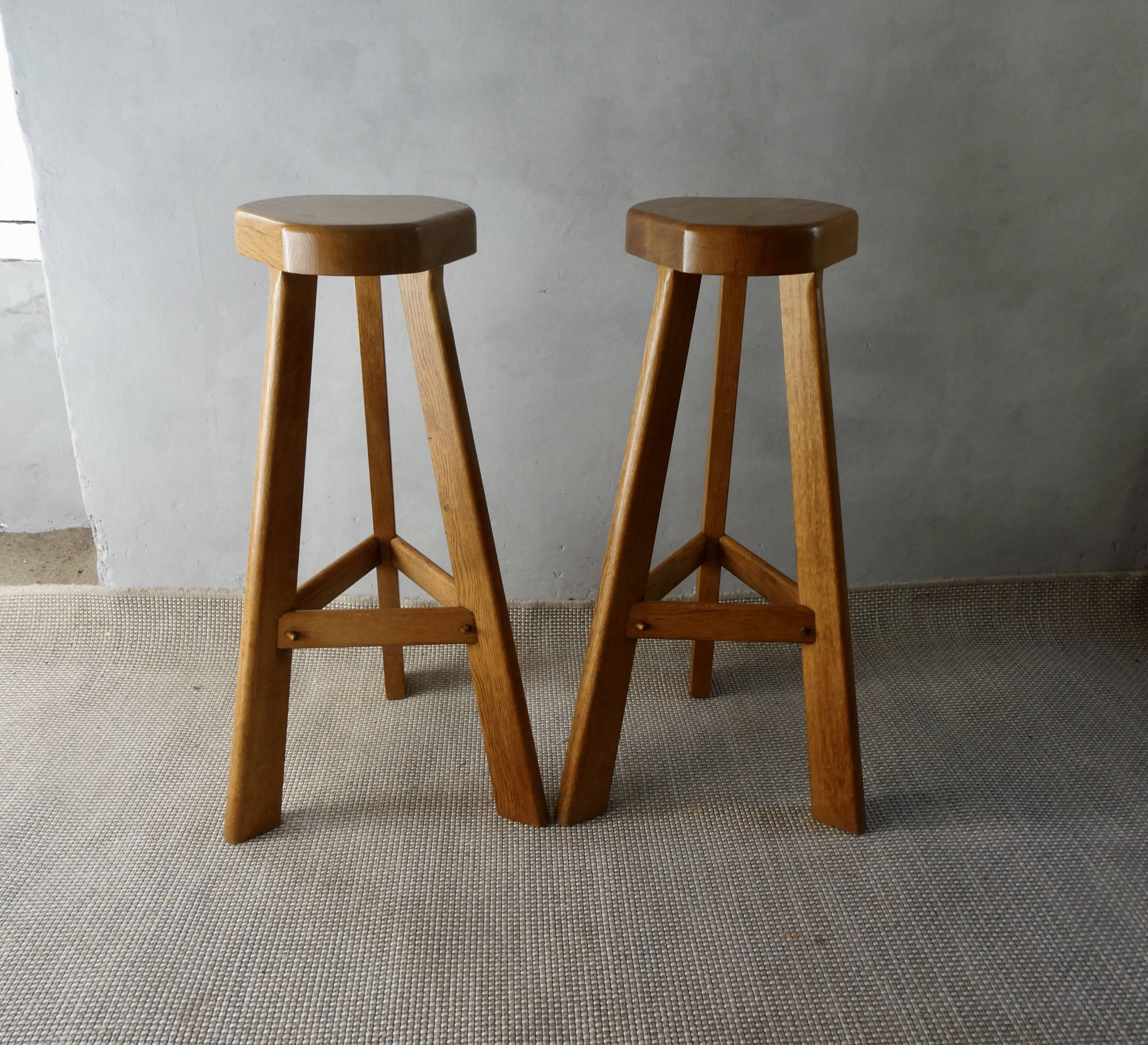 Pair of high bar stools, tripods, in solid wood