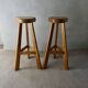 Pair of high bar stools, tripods, in solid wood