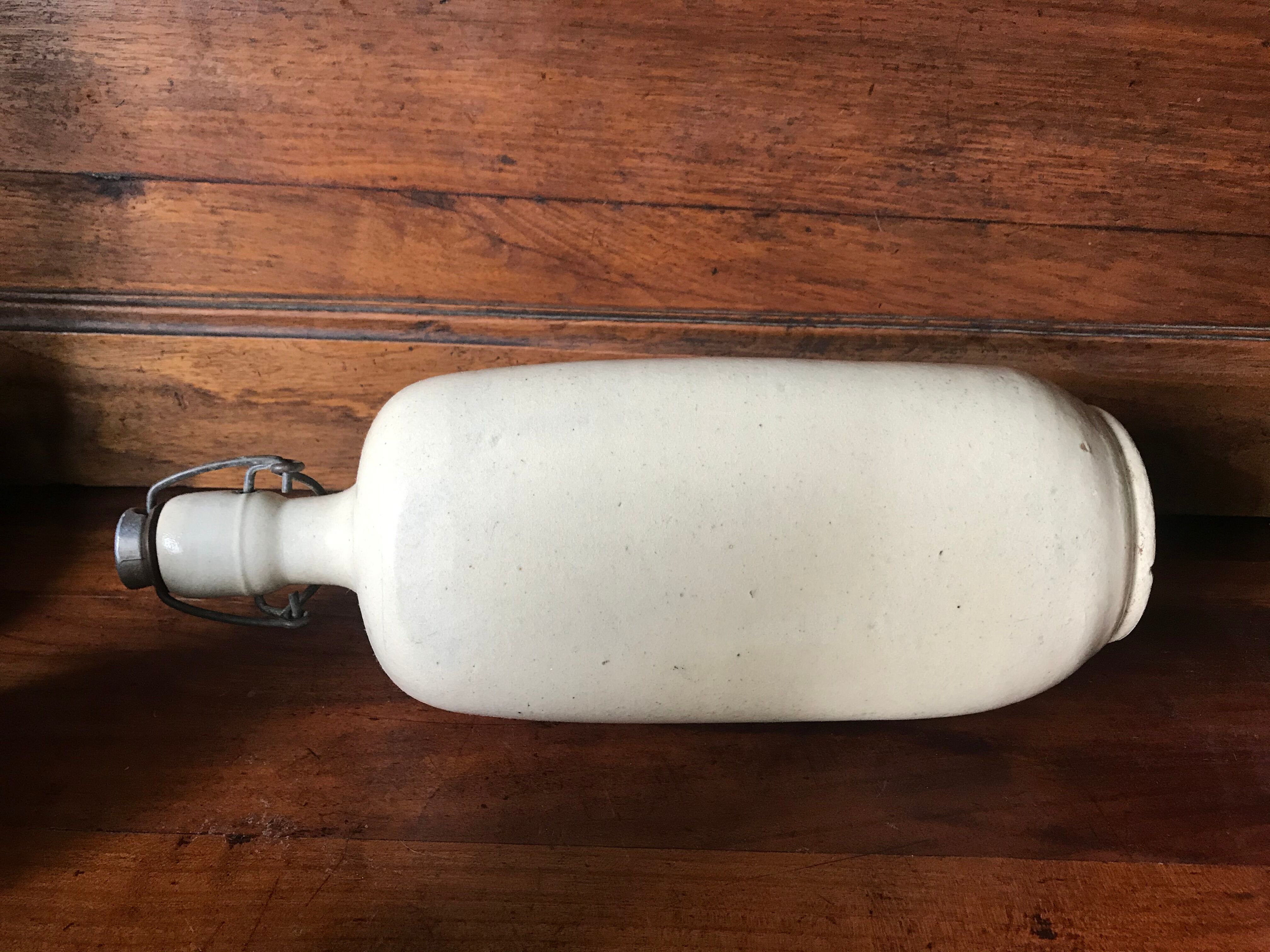 Bottles in varnished sandstone