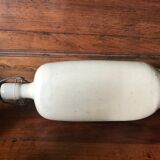 Bottles in varnished sandstone