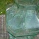 Square bottle of molded-pressed glass with faucet