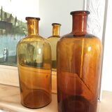 Duo of amber apothecary bottles