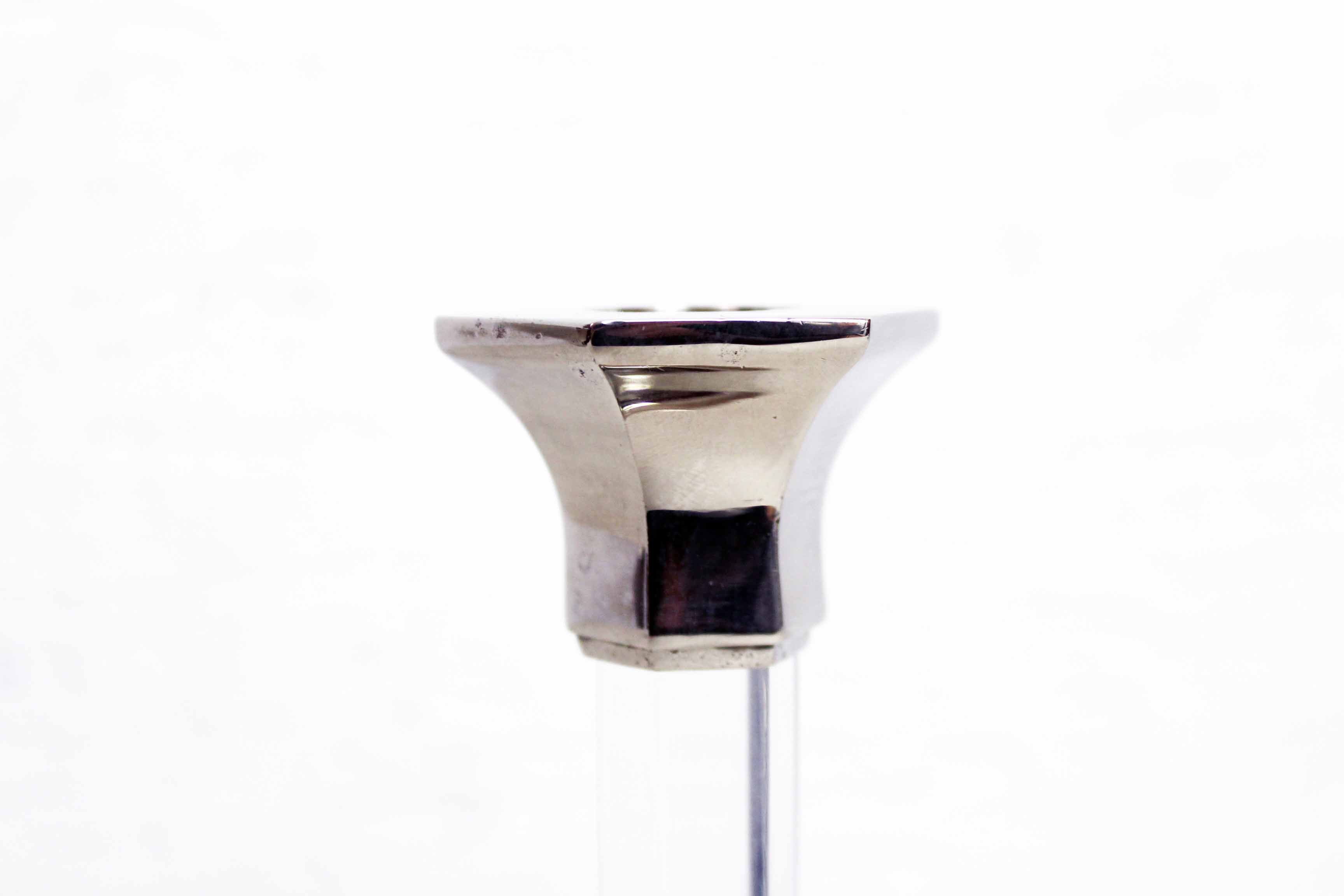 Duo of candlesticks in lucite and silver metal