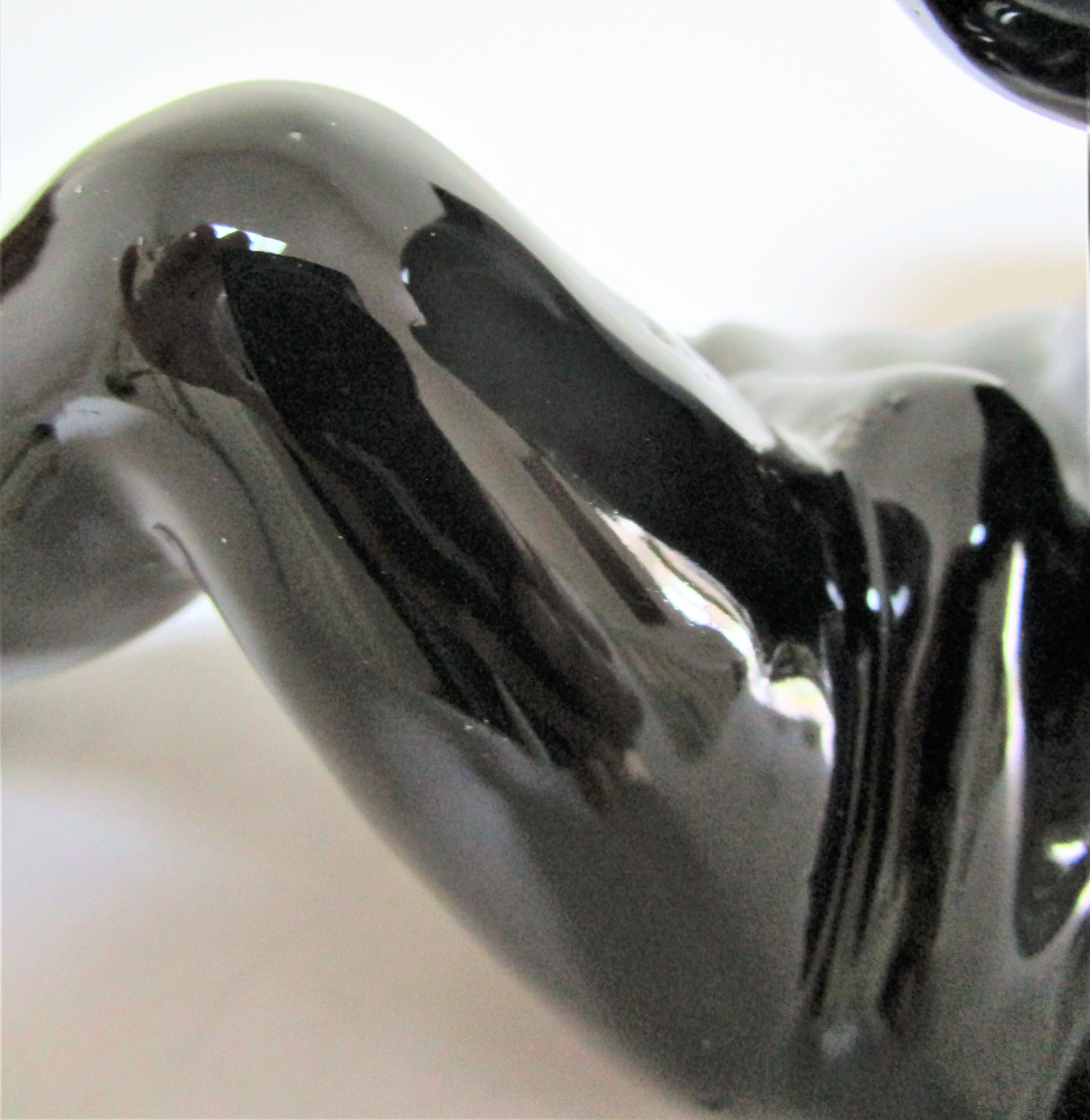 Anthropomorphic ashtray legs ceramic black design 80s