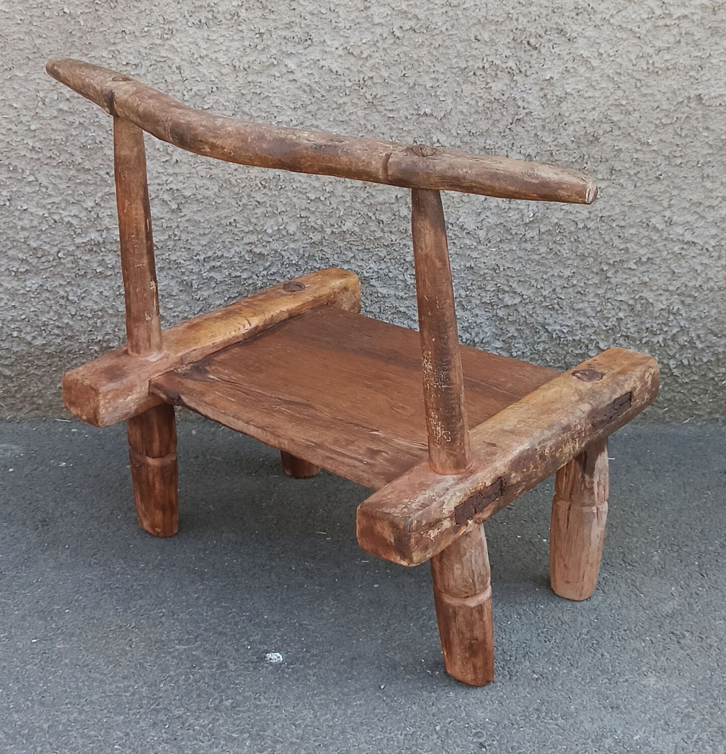 Antique wooden stool. Baoulé African art from Ivory Coast.