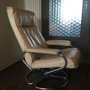 Mid-century danish leather & tubular steel swivel lounge armchair