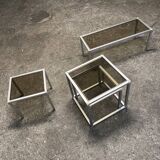 Set of coffee tables, pedestal tables and nesting tables in smoked glass and metal
