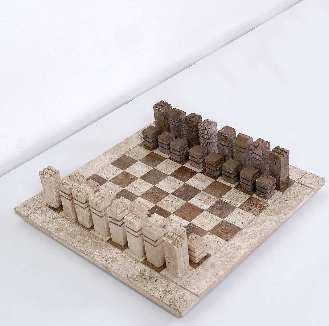 Modernist two-tone travertine chess set, Italy, 1970s