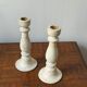 Pair of white wooden candlesticks