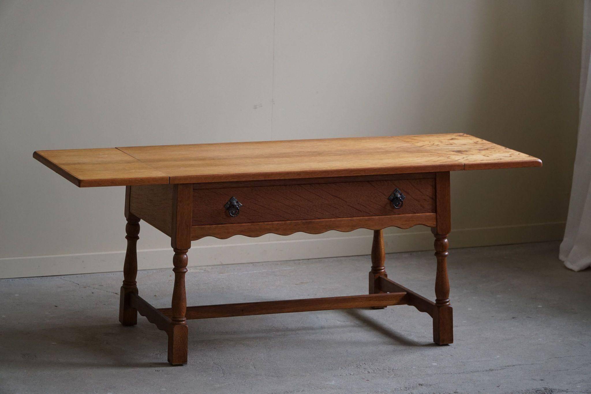 Danish folding table from the mid-century with a drawer in oak, Henning Kjærnulf, 1960s.