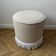 Round Ottoman with Fringe Bottom, Cream Boucle Upholstered Pouf