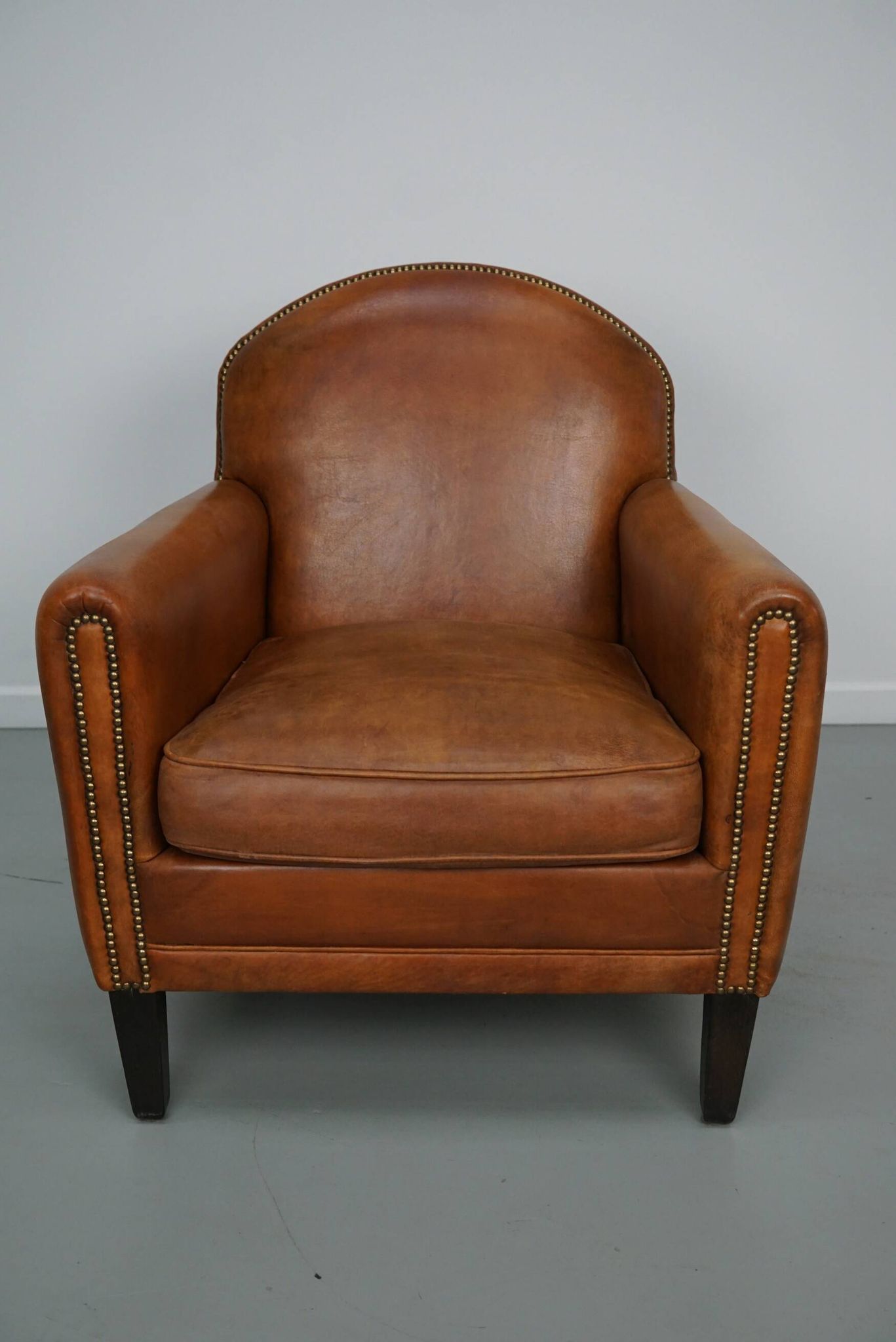 Vintage Dutch leather club chair in cognac color