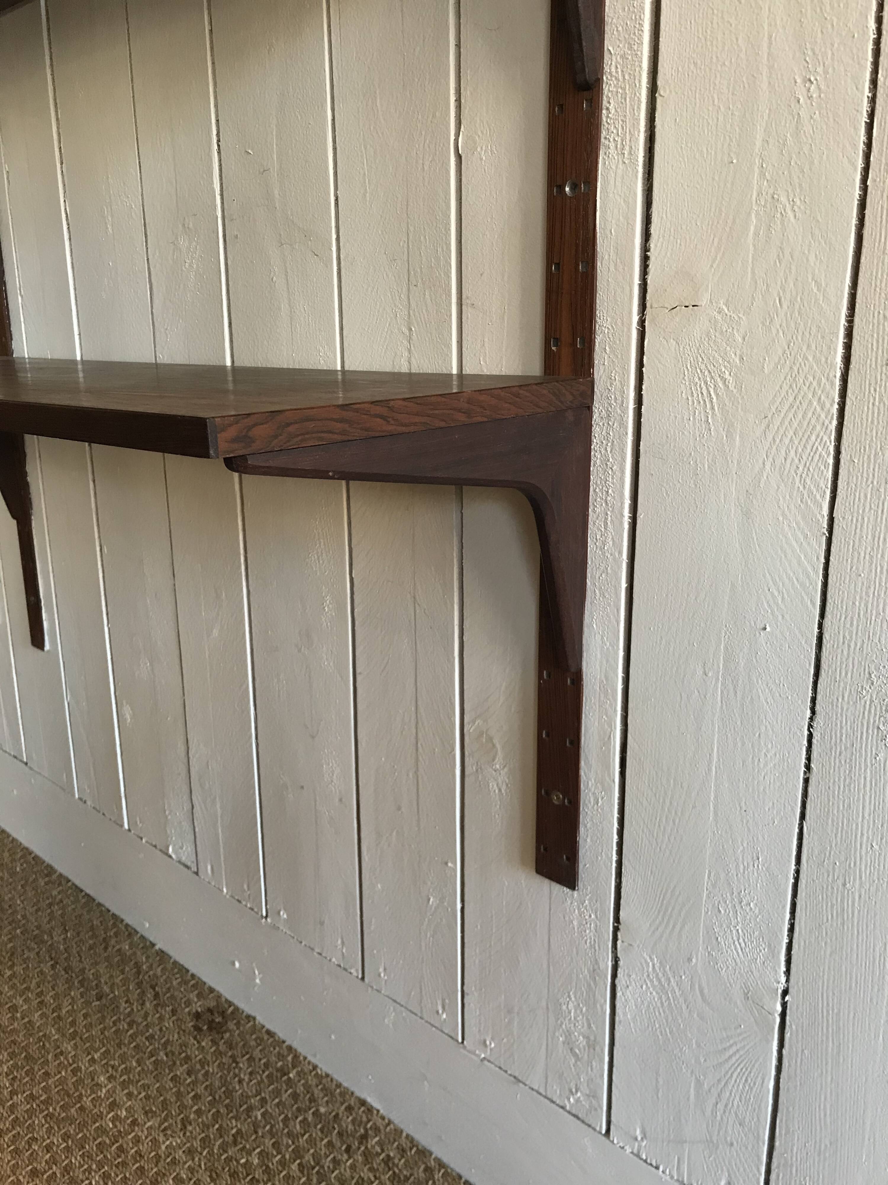 Wall shelves in rosewood by Poul Cadovius