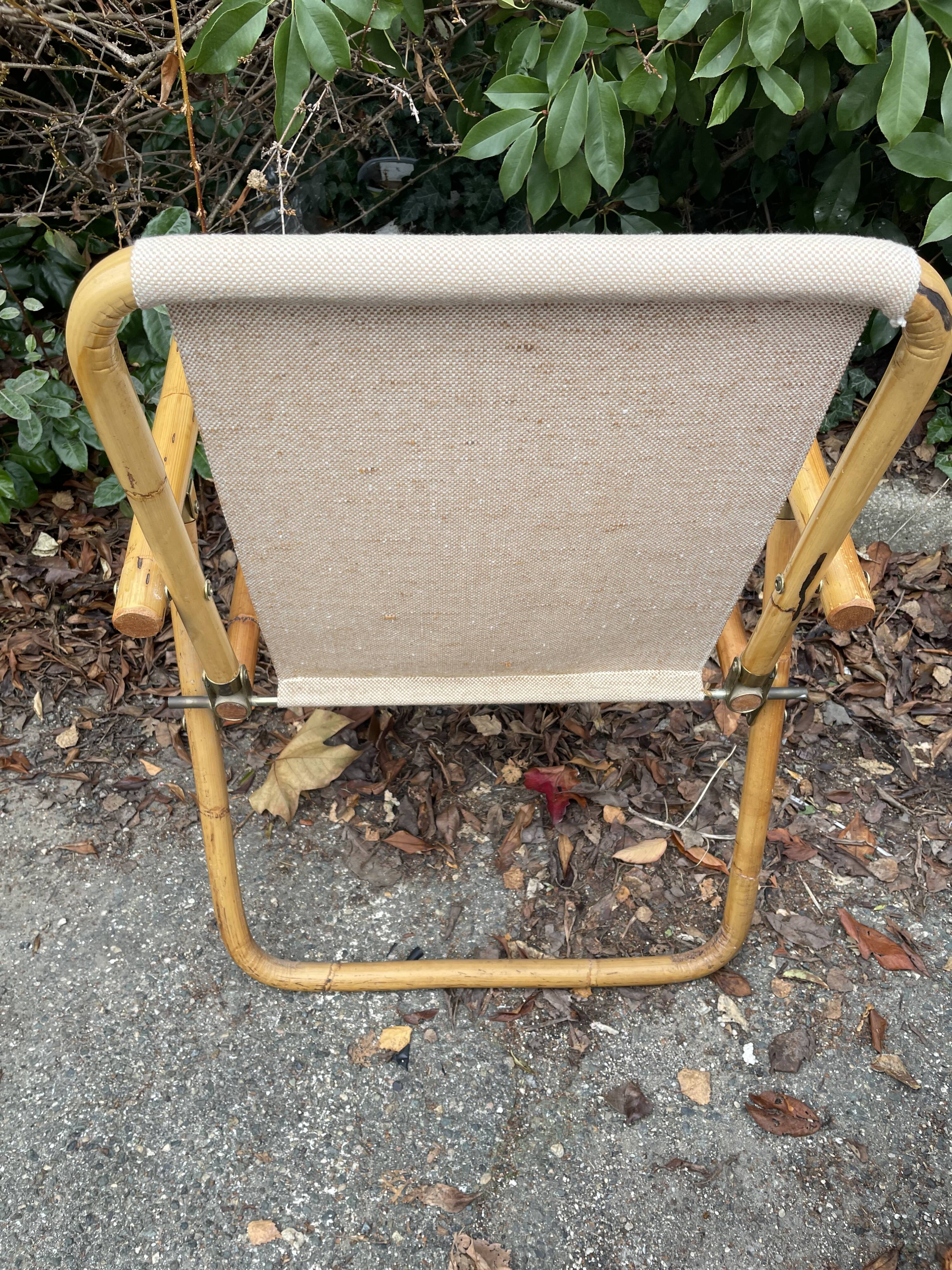 Rattan armchair and foldable canvas